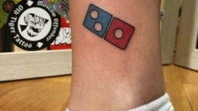 Moscow Court Upholds Tattoo Ruling In Favour Of US Domino’s Pizza  
